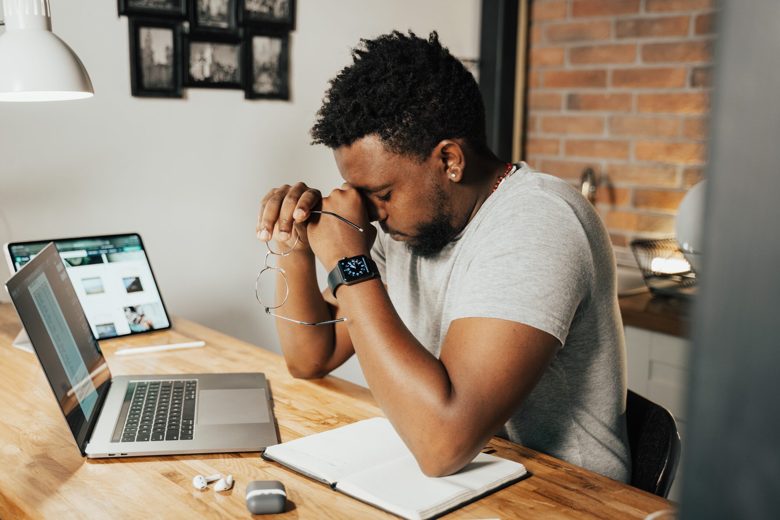 man working in home office using laptop